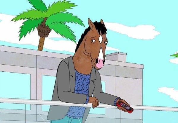 Bojack déprimé sur le balcon de son appartement