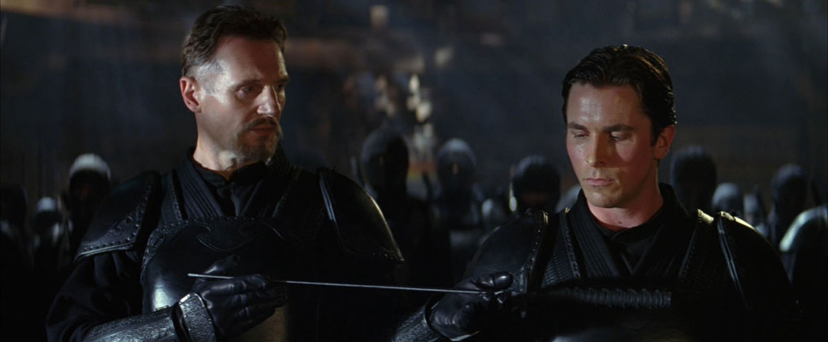 Christian Bale et Liam Neeson dans Batman Begins