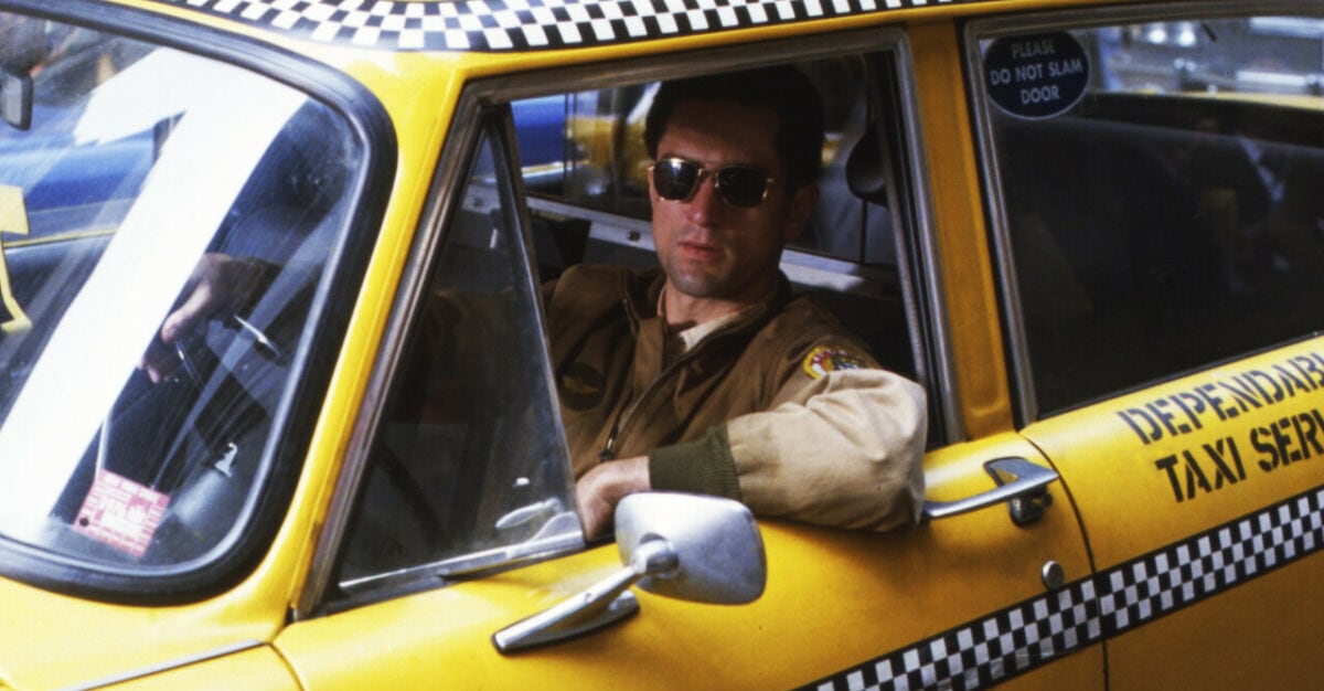 Robert De Niro au volant de son taxi dans Taxi Driver